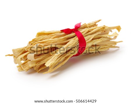 Dried yuba sticks or Fuzhu on white background