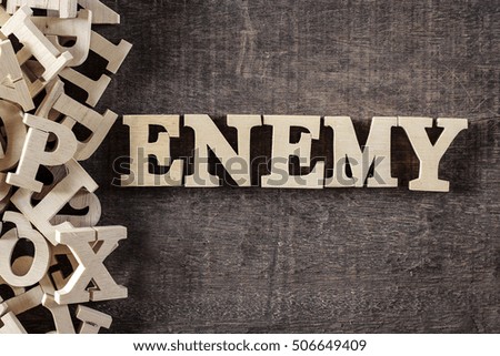 ENEMY word made with wooden letters