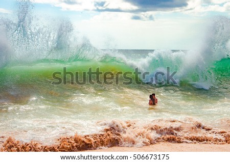 Incredibly high waves on the tropical beach in Bali, Indonesia Royalty-Free Stock Photo #506673175