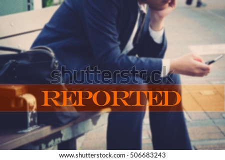 Hand writing reported with the abstract background. The word reported  represent the action in business as concept in stock photo.