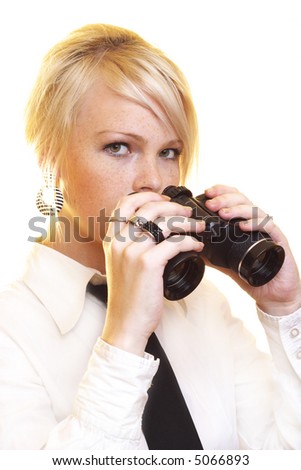 Blond business woman with binocular looking into the future