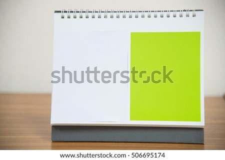 Blank paper desk spiral calendar on the table