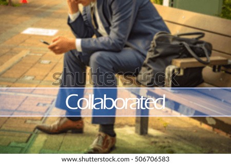 Hand writing collaborated with the abstract background. The word collaborated  represent the action in business as concept in stock photo.