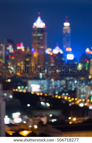 Twilight blurred city tower lights, abstract background