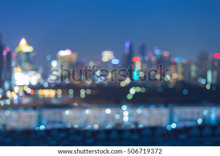 Blurred lights city downtown with clear blue sky abstrat background