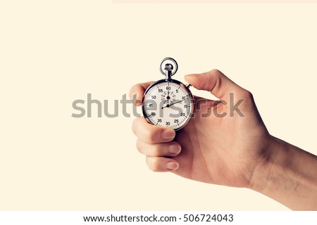 timer held in hand Royalty-Free Stock Photo #506724043