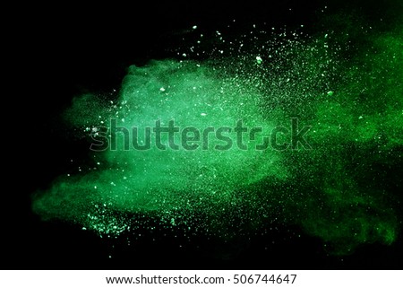 abstract powder splatted background, Freeze motion of green powder exploding/throwing green powder