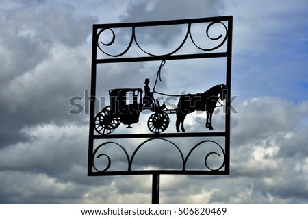 Horse and cart in silhouette