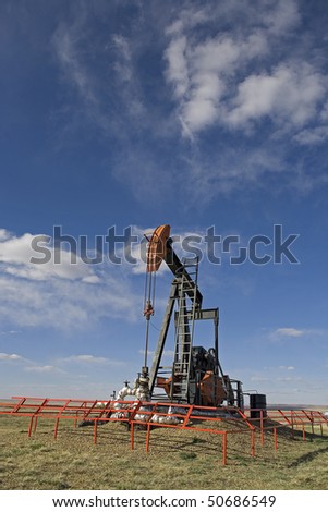 oil jack against the blue sky background