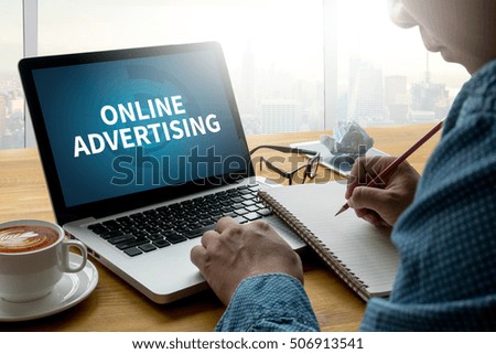ONLINE ADVERTISING Thoughtful male person looking to the digital tablet screen, laptop screen,Silhouette and filter sun