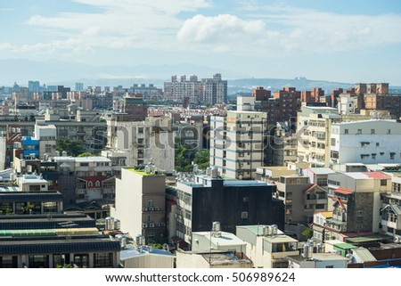 Business and culture concept - panoramic modern city skyline bird eye aerial view under dramatic morning blue cloudy sky in Taiwan