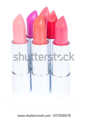 puple, pink and red shiny lipsticks group isolated on white background
