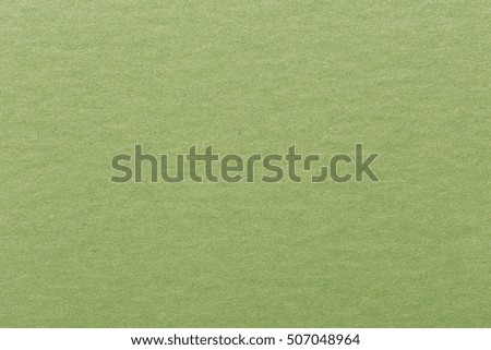 Blank piece of green paper as background. High quality image.