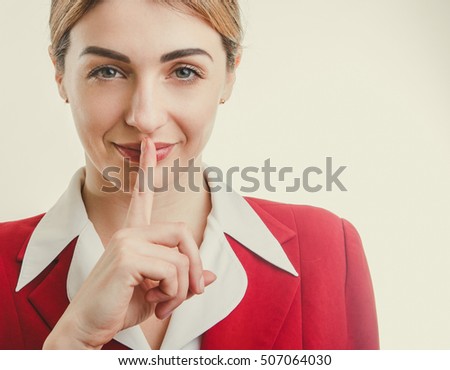 Business concept - lady in red jacket. Secret silent