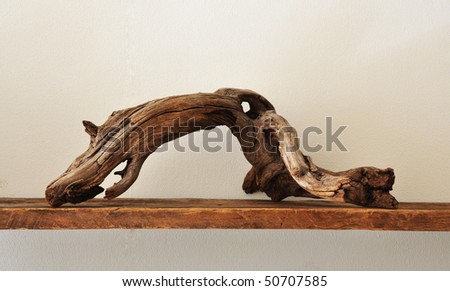 crooked driftwood on a shelf Royalty-Free Stock Photo #50707585