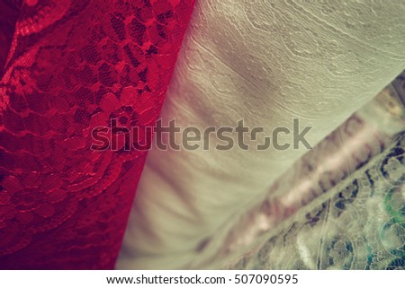 Lace fabric rolls. Close up retro look background.