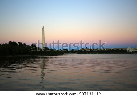 washington monument at sunset near the lake