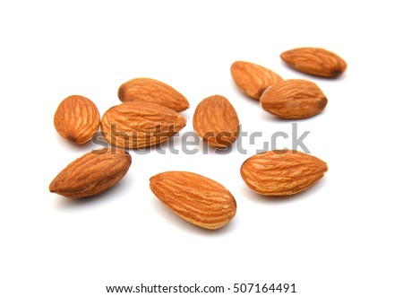 Almonds isolated on white background Royalty-Free Stock Photo #507164491