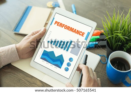 Business Charts and Graphs on screen with PERFORMANCE title