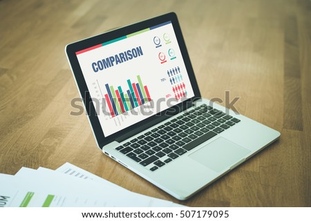 Business Charts and Graphs on screen with COMPARISON title