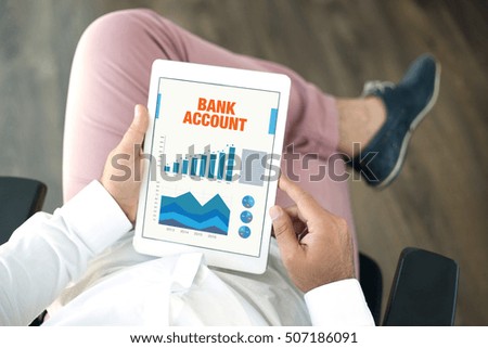 Business Charts and Graphs on screen with BANK ACCOUNT title