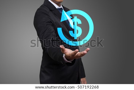 Businessman working with modern virtual technology, hand touching pointing to businessman icon return on investment Royalty-Free Stock Photo #507192268