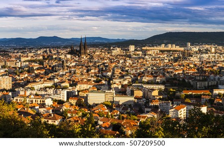 Panorama of Clermont-Ferrand at sunset. Clermont-Ferrand, Auvergne-Rhone-Alpes, France. Royalty-Free Stock Photo #507209500