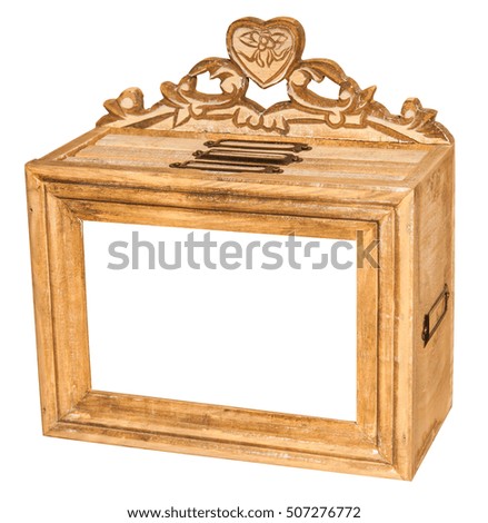 Vintage yellow wooden box with picture frame decorated carved heart. Isolated on white background.