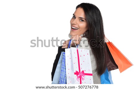 Young Modern Beautiful woman with a lot of shopping bags