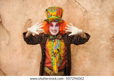 A positive and joyful Hatter on an isolated background