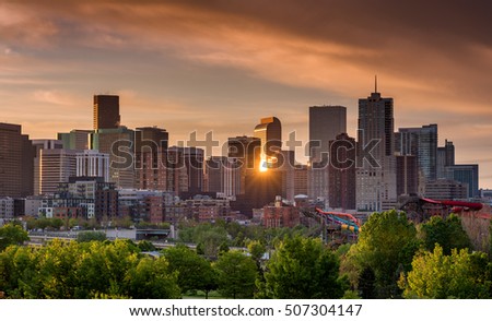 Unique view of the Denver Colorado skyline with a sun star reflection