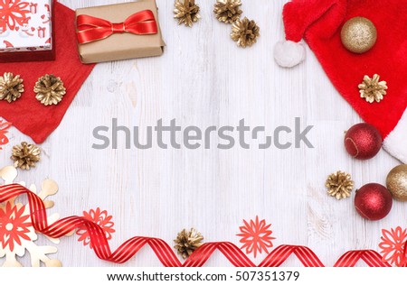 Merry Christmas and Happy New Year golden and red decorations on a white background. Top view with copy space