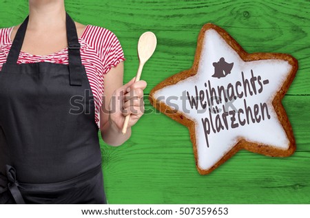 Weinachtsplaetzchen (in german Christmas cookies) Cinnamon star is shown by chef