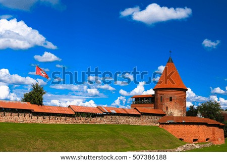 Old castle in Kaunas, Lithuania. The restored castle on a background of blue sky. The fortress in the old town.