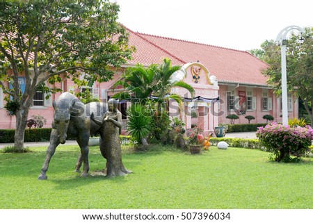 Bronze sculptures in front of Ratchaburi National museum, written in white plate at the back and above white text one is Ratchaburi Town Hall sign.