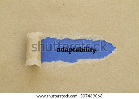 Adaptability word written under torn paper.