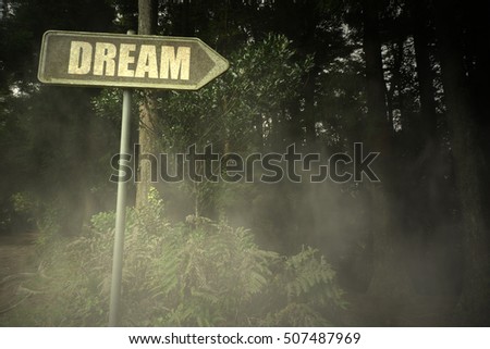 vintage old signboard with text dream near the sinister forest