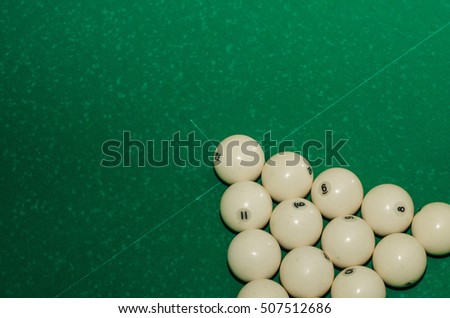 Russian billiards balls and cue on the table, the pyramid
