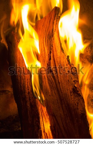 Abstract fire figures. An image of fire in the fireplace taken with a macro lens.