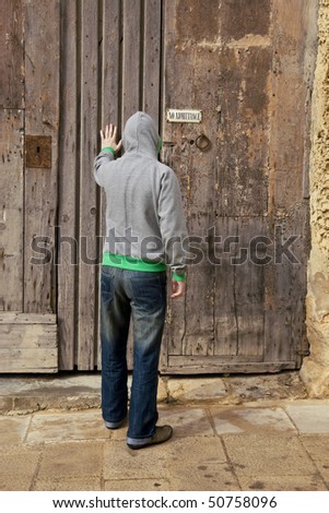 A man trying to gain entry