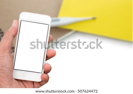 Hand holding mobile smart phone with blank screen in vertical position, Medical background - mockup template.