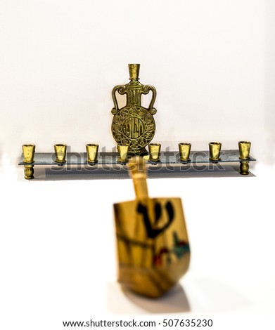 Channukah Menorah and Drediel / Jewish spinning top with Jewish candelabra / Channukah Menorah and Drediel 