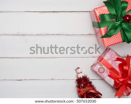 christmas gift box decoration with wood  background
