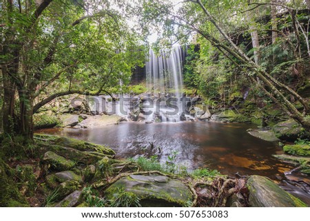 Landscape photo, Waterfall, beautiful waterfall in rainforest at Phu Kradueng, Loei province, Thailand.