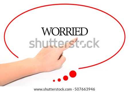 Hand writing WORRIED  with the abstract background. The word WORRIED represent the meaning of word as concept in stock photo.