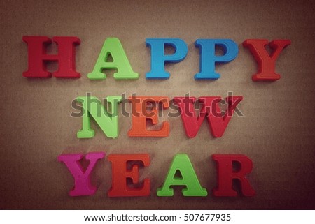 Happy New Year concept. Letters on background