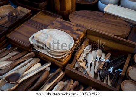 Equipment and tableware made of wood in Wattanatum Walking strees in lampang at thailand