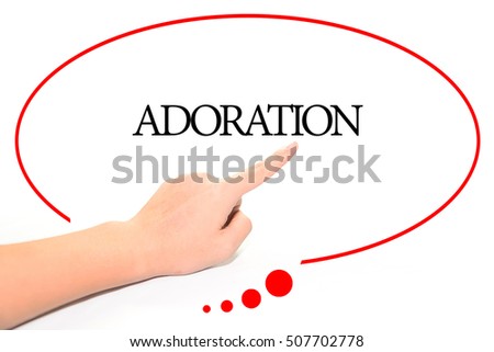 Hand writing ADORATION  with the abstract background. The word ADORATION represent the meaning of word as concept in stock photo.