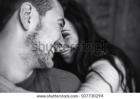 young beautiful couple in studio, photograph from close angle