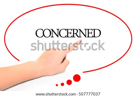Hand writing CONCERNED  with the abstract background. The word CONCERNED represent the meaning of word as concept in stock photo.